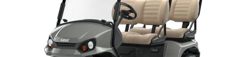 Gray golf cart with tan seats and windshield