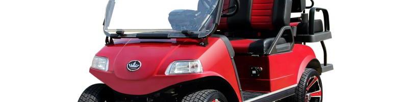 Red golf cart with black accents and seating
